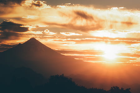 aerial photo of mountain during sunset thumbnail