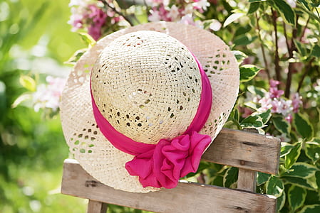 brown straw hat with pink bow accent thumbnail