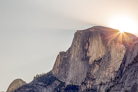photography of brown mountain during golden hour thumbnail