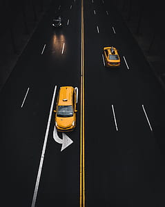 cars passing by road thumbnail