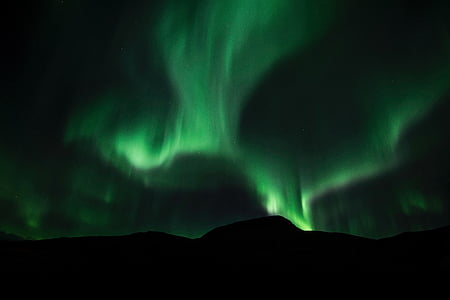 silhouette of mountain under sky phenomenon thumbnail