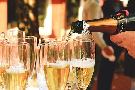 Sparkling champagne poured at party thumbnail