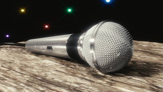 gray corded microphone on table thumbnail