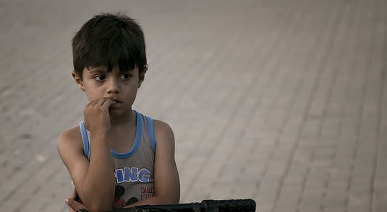 boy biting his hands thumbnail