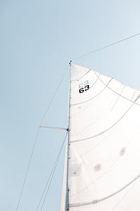low-angle photo of white boat sail thumbnail