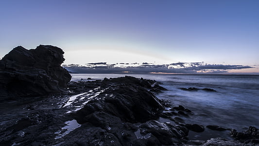 rock formation under blue sky thumbnail