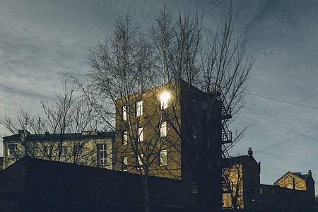 Sun reflection on old house thumbnail