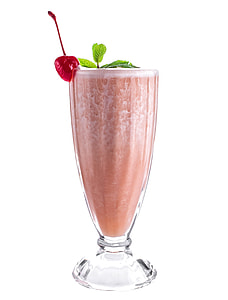 fruit shake in clear footed cocktail glass garnished with cherry fruit and mint leaves thumbnail