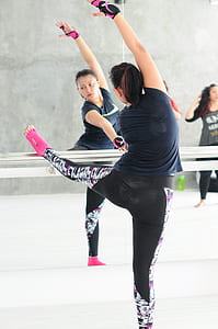 woman in black t-shirt dancing thumbnail