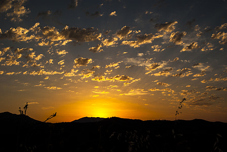 silhouette of mountain during golden hour thumbnail
