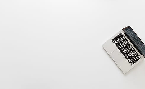 flat lay photography of MacBook Pro thumbnail