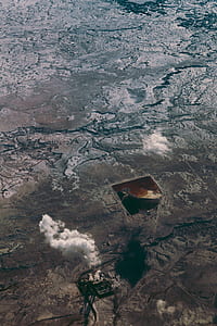 aerial view photography of brown island thumbnail