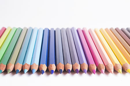 assorted-color colored pencils lot on white surface thumbnail