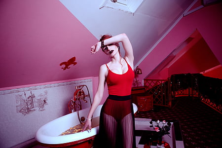 woman in red spaghetti strap tops thumbnail