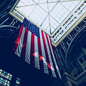 low-angle photography of flag of America thumbnail