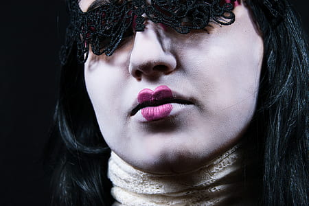 woman wearing black headdress thumbnail