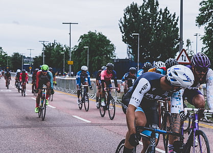 group of people riding on assorted-color road bicycles thumbnail