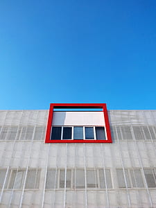 building under blue sky thumbnail