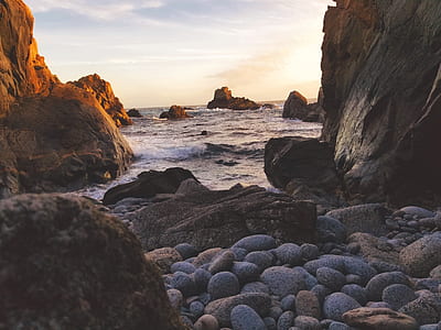 pile of stones near on beach sore thumbnail
