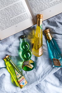 Group of colorful little bottles with liqueurs thumbnail