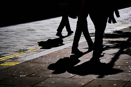people walking on street photo thumbnail