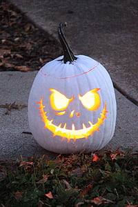 lighted Jack-o-lantern on road thumbnail