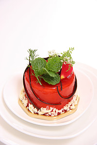 red and white cake on white ceramic plate thumbnail
