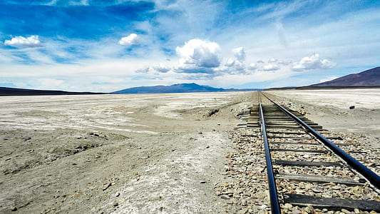 black train rail photo during daytime thumbnail
