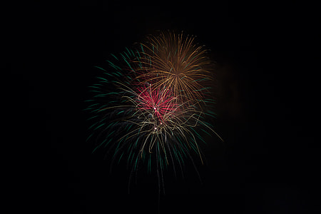 red and blue fireworks on sky thumbnail
