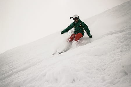 man doing snow ski on a mountain thumbnail