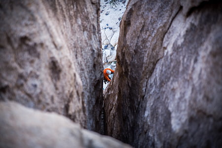 man climbing on rock thumbnail
