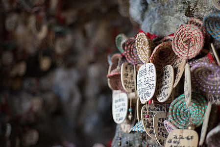 assorted-color keychain lot on wall thumbnail