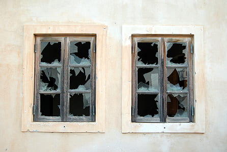 two beige framed broken glass windows thumbnail