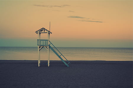white and blue wooden lifeguard tower thumbnail