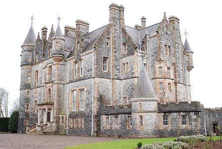 gray and brown brick castle under white sky at daytime thumbnail