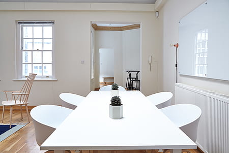 rectangular white wooden table with four chairs dining set on floor thumbnail