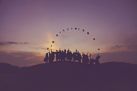 silhouette of people on mountain thumbnail