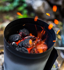 burning stones during daytime thumbnail