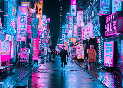 man walking on grey concrete road thumbnail