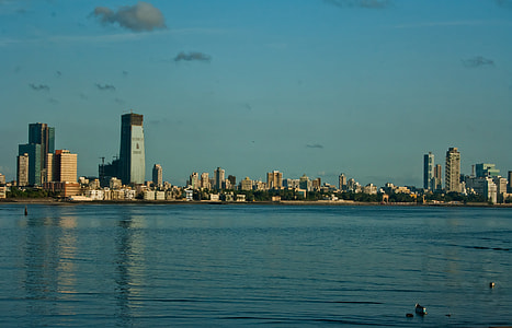 city buildings near body of water thumbnail