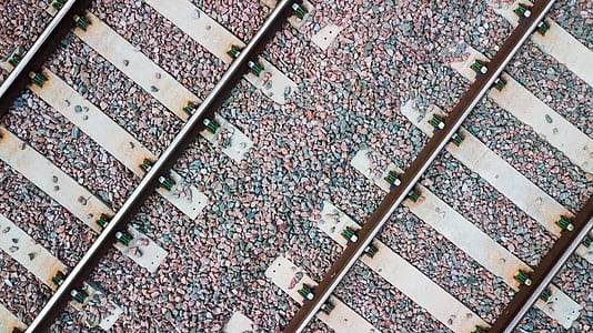 close up photography of train railways thumbnail
