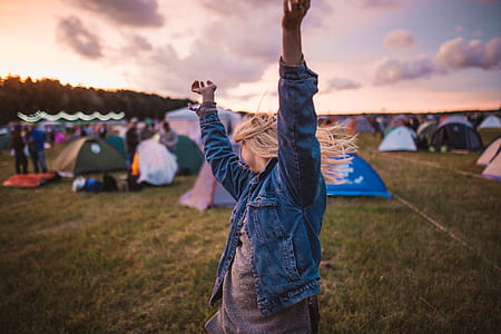 woman holding hands up thumbnail
