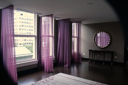 purple window panel hanged on black rod thumbnail