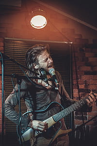 man playing silent guitar thumbnail