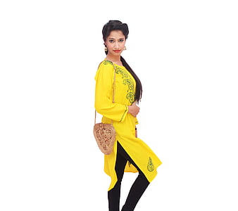 woman wearing yellow and black long-sleeved dress with leggings thumbnail