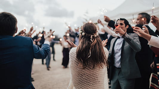 group of people holding clear footed glasses thumbnail