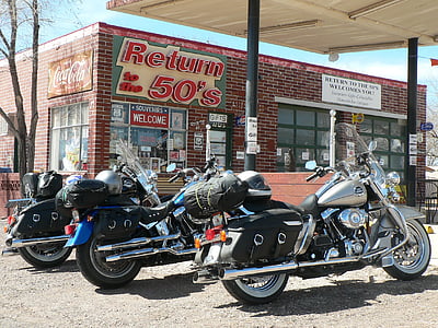 three touring motorcycles parked near Return to the 50's store thumbnail