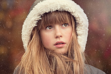 woman wearing grey and white hooded jacket thumbnail