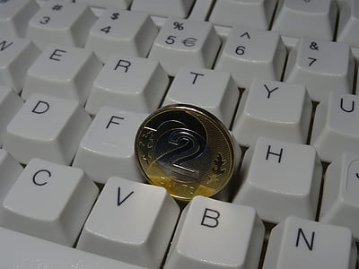 round gold-colored coin thumbnail