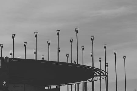 Grayscale Photo of Road Light Post Lot thumbnail